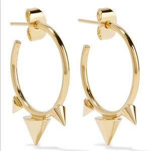 Isabel Marant gold time on brass spike earrings.